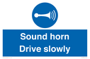 sound-horn-drive-slowly-warehousing-and-delivery-sign~